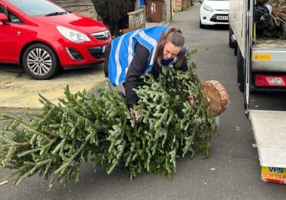 St-Anns-Hospice-volunteer-collecting-trees-January-copy-2024-750x400